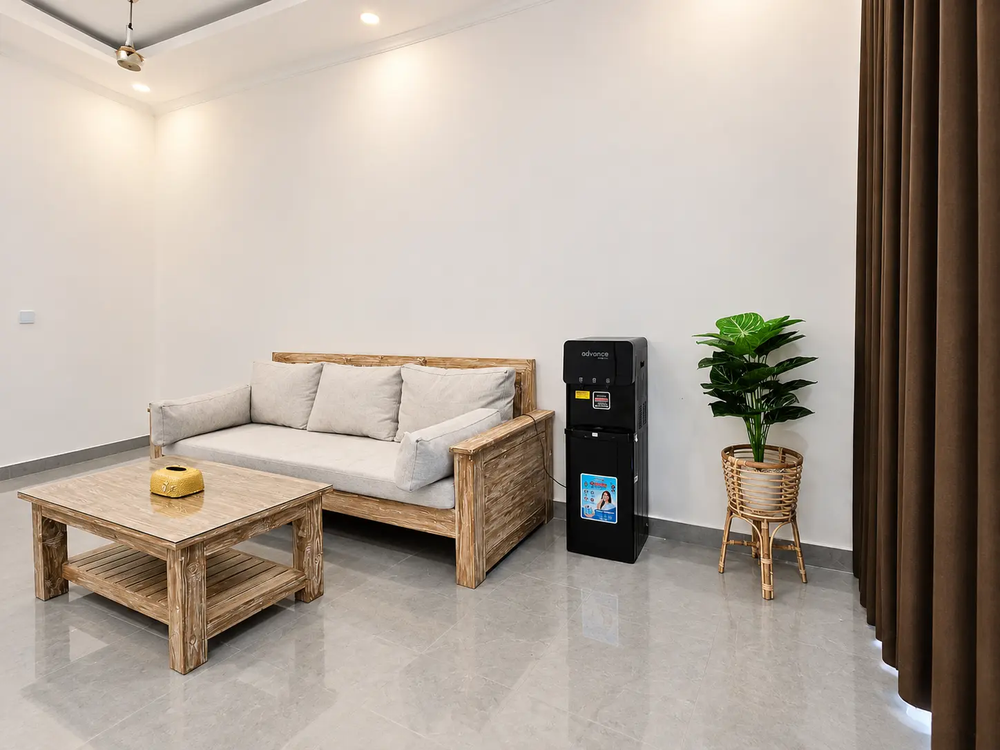 Living room with sofa and water dispenser